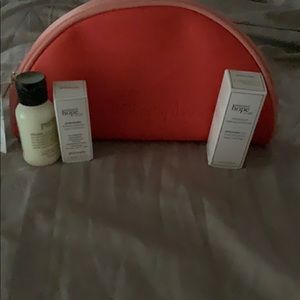 Philosophy bag with set of three skin care travel